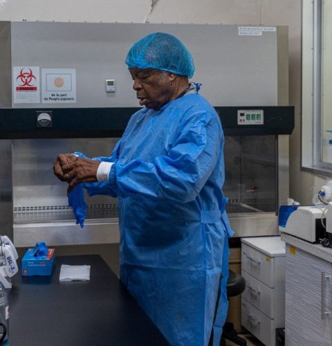 (FILES) Professor Jean-Jacques Muyembe, director general of the National Institute for Biomedical Research (INRB), wears protective gloves inside an INRB laboratory in Kinshasa, Democratic Republic of the Congo, on May 20, 2026. We have always won the battle against Ebola: 50 years after taking part in the discovery of the virus, Congolese virologist Jean-Jacques Muyembe, now 84, is at the forefront of the response to contain the 17th epidemic to strike the Democratic Republic of Congo (DRC).
Central Africas largest country declared a new outbreak of hemorrhagic fever on May 15, which has already infected 782 people and caused 181 deaths, mainly in the troubled and remote province of Ituri in the northeast.
To date, there is no vaccine or specific treatment for the Bundibugyo virus responsible for the current outbreak. Existing vaccines are only effective against the Zaire virus. (Photo by Hardy BOPE / AFP)